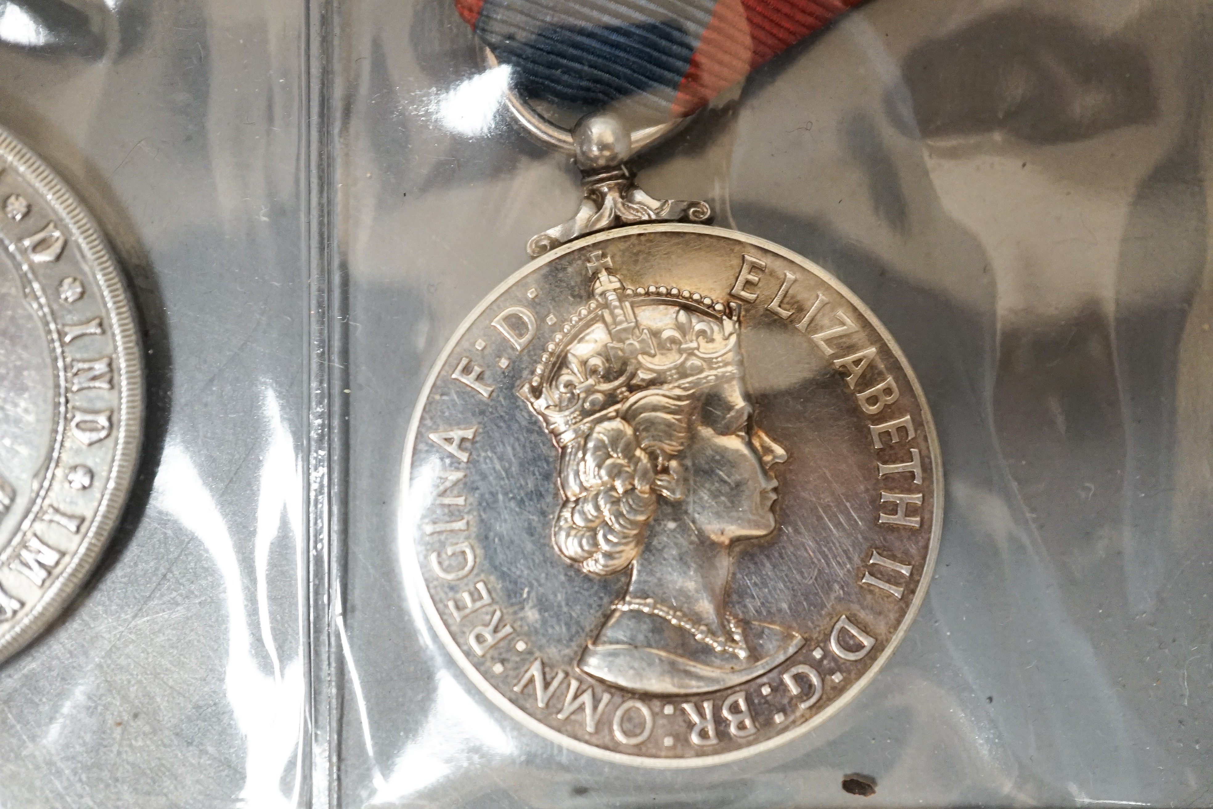 Three Imperial Service medals to Edward James Parker, William Horsfield and Albert Edward Ellis and two Service medals of the Order of St John to 13472 A/SIS.M.TIDMAN.BRISTOL.NO.1.NSG.DIV.NO.2DIS.JAB. 1935 and E692 SGT.